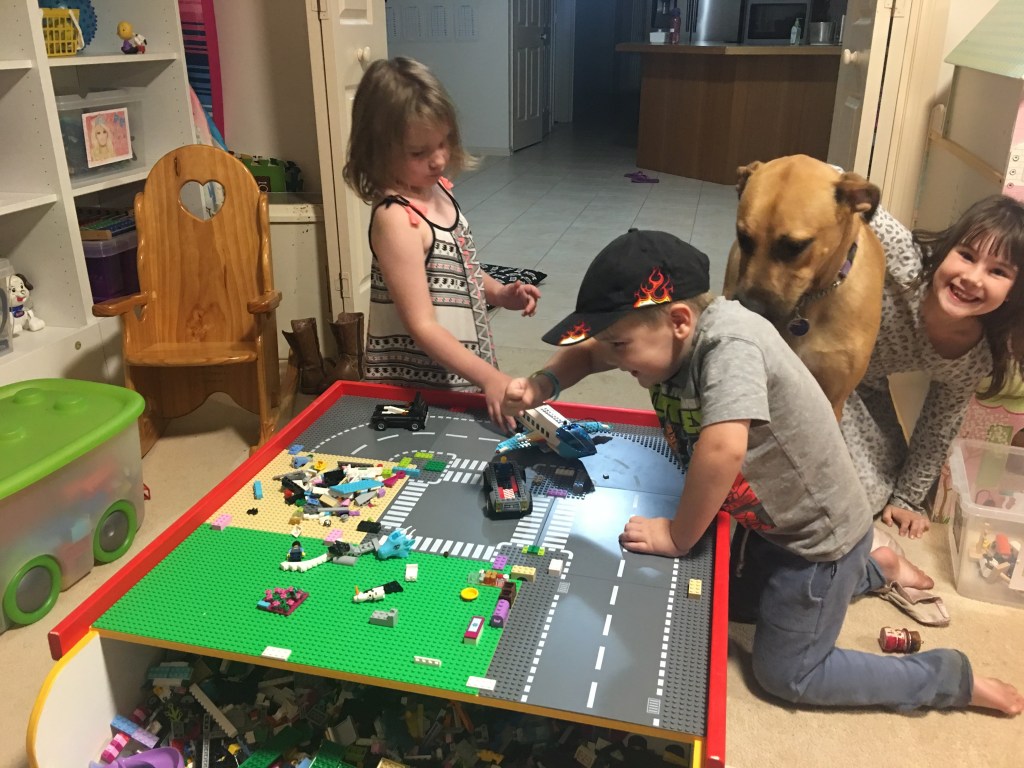 Kids & dog playing with the finished table